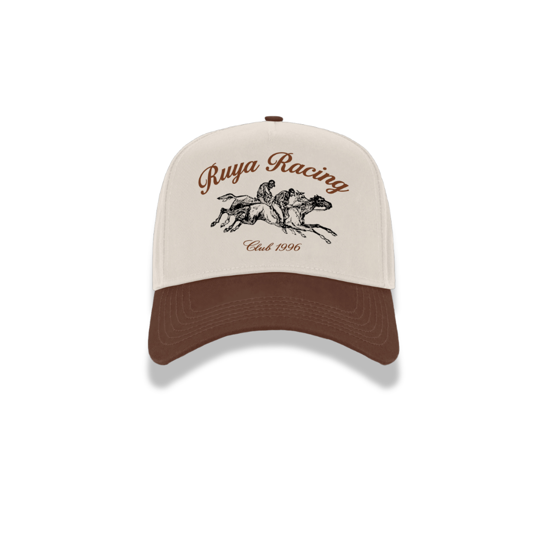 Baseball cap with 'Roya Racing' logo on a white background